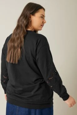 EVANS Curve Black Cutwork Crew Neck Sweatshirt 10 EVANS Curve Black Cutwork Crew Neck Sweatshirt -Evans Boutique 1ef84fb7 ee5f 40 615506 C