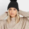 Bonnet à Pompon En Fausse Fourrure Noire 1 Bonnet à Pompon En Fausse Fourrure Noire -Evans Boutique 2e5344e8 3919 46 246125 A