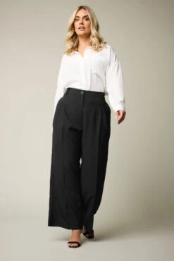 YOURS Curve Pantalon Large Tissé Noir à Plis Sur Le Devant -Evans Boutique 46760fb2 1329 46 143970 C