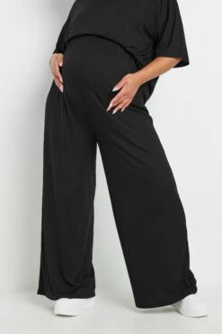 BUMP IT UP MATERNITY - Pantalon Wide Leg Noir Nervuré